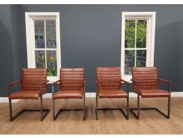 Clearance Dakota Dining Chairs Set Of 4, upholstered in leather with a metal frame